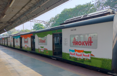Mumbai train advertising showcasing retail brand promotions targeting daily commuters